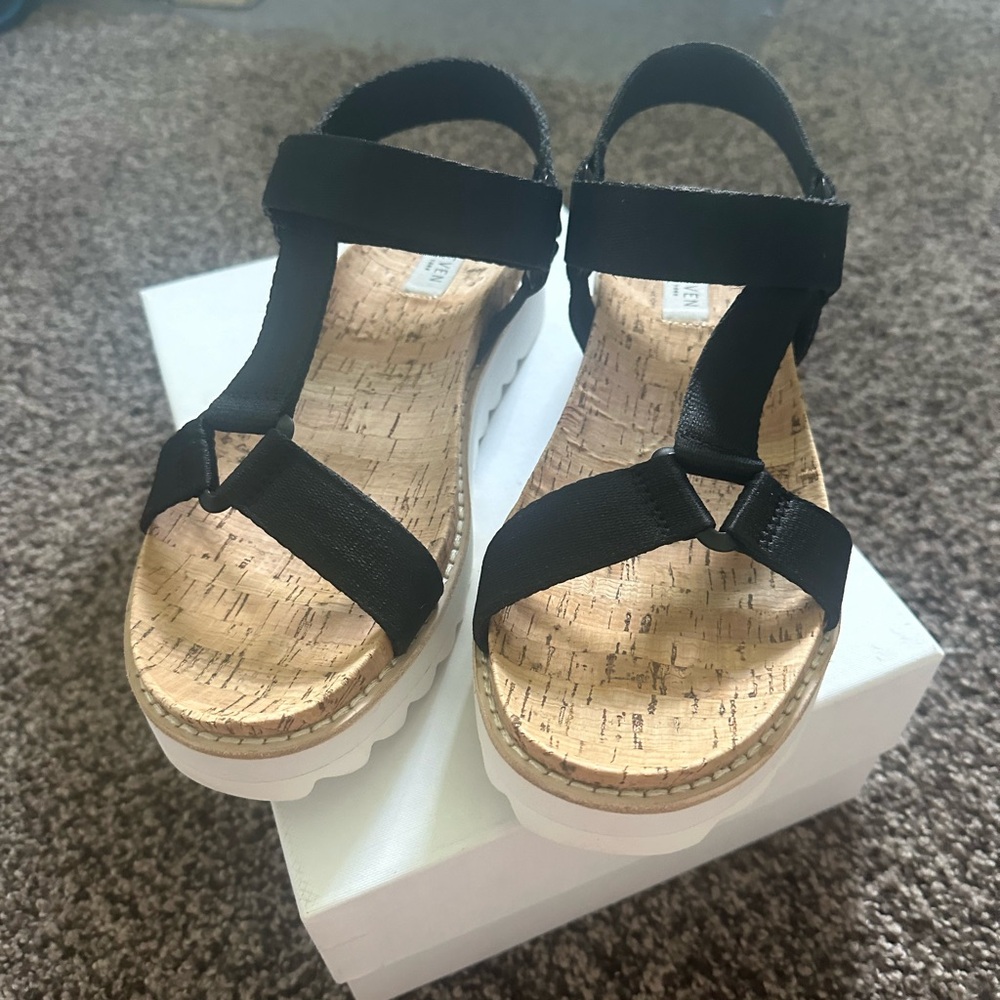 A brand new pair of Steve Madden sandals.